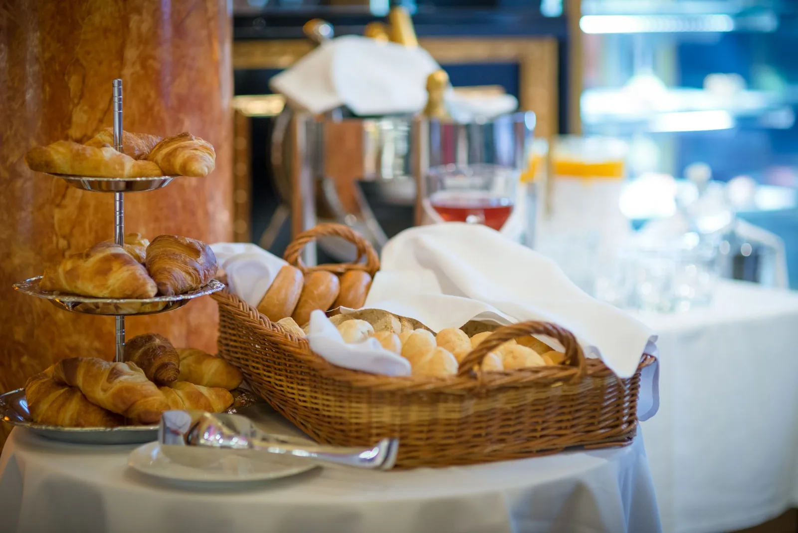 A warm display of freshly baked breads and bakery goods