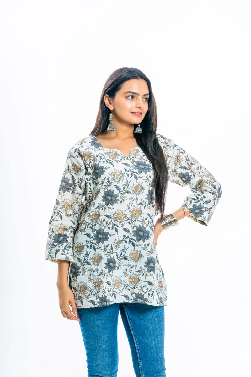 Woman wearing a floral cotton tunic top