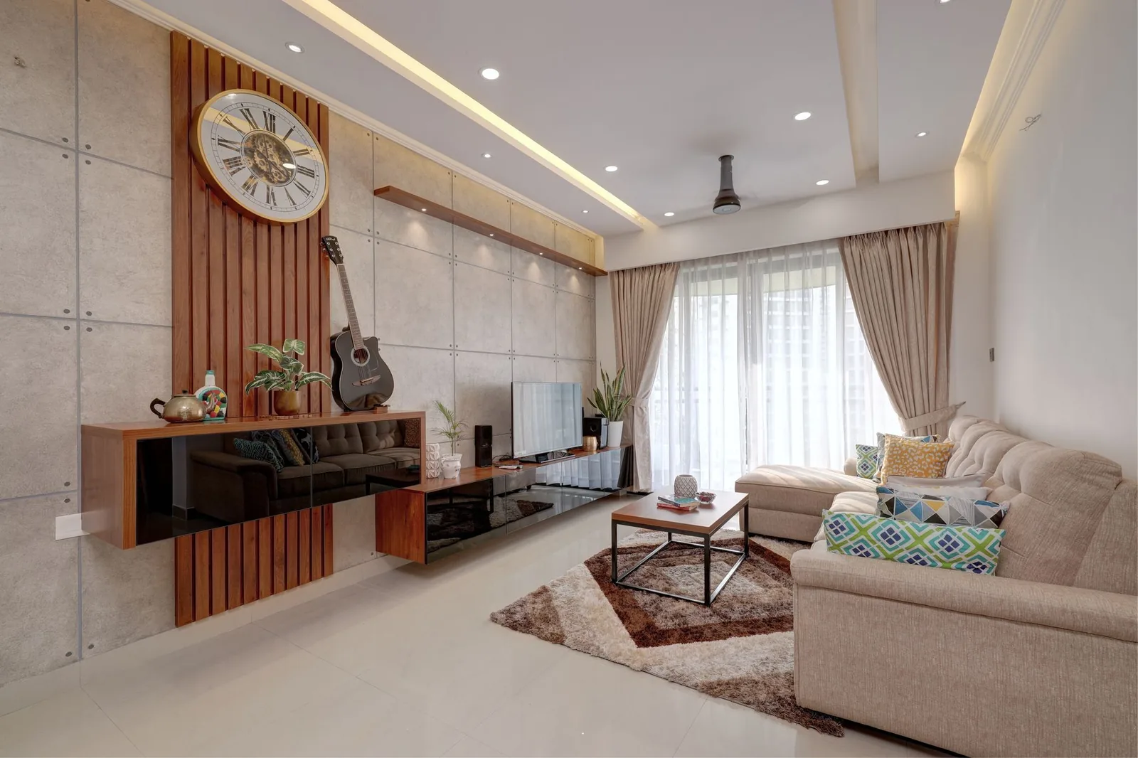 Warm, sunlit modern living room with wooden accents and neutral textiles
