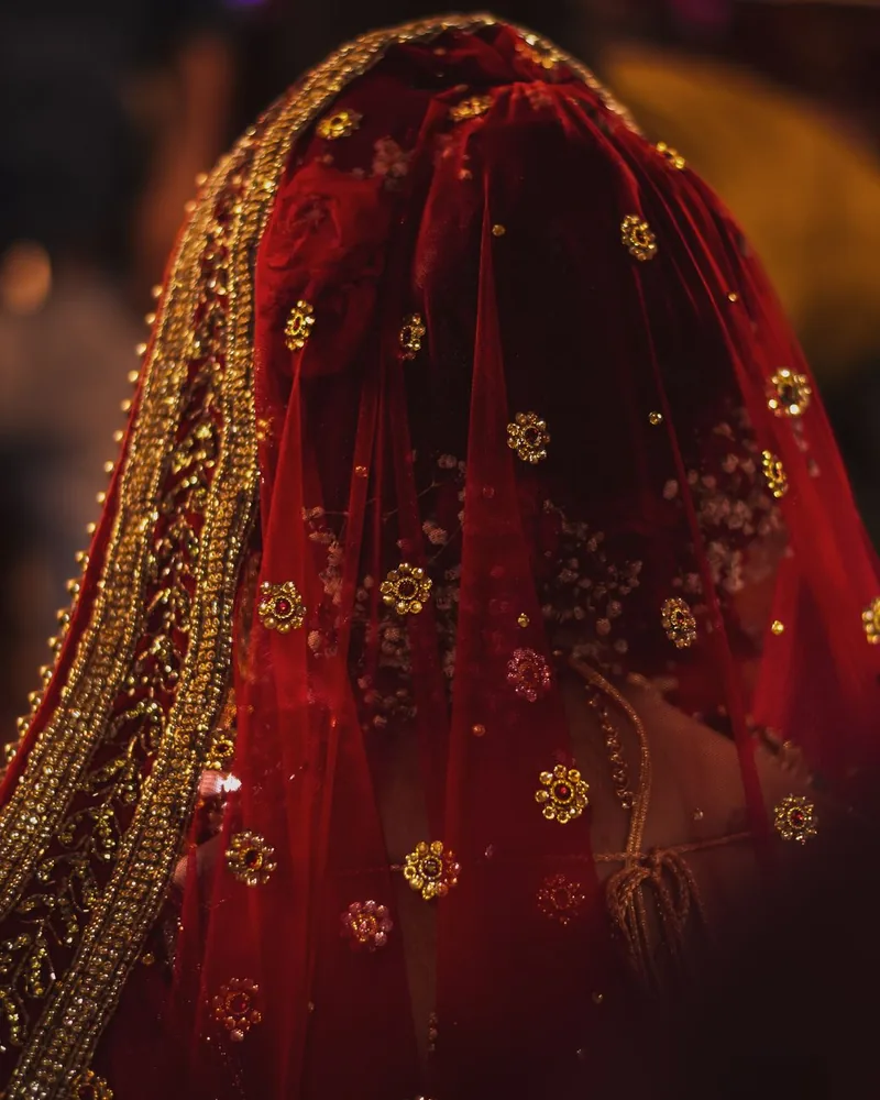 Festive embroidered piece in red and gold